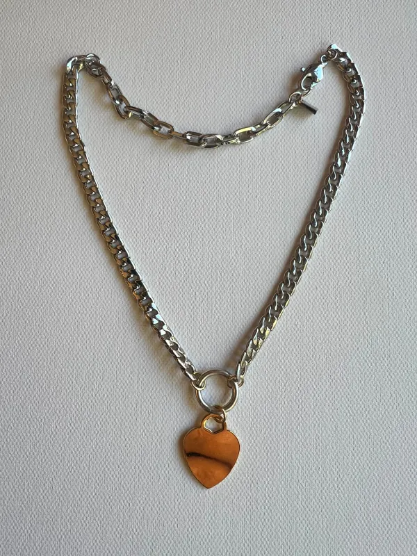 The Gold Heart & Silver Chain Necklace sold by Vanessa Mooney