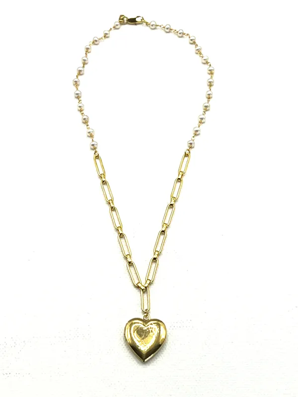 The Heart Locket Necklace made by Vanessa Mooney