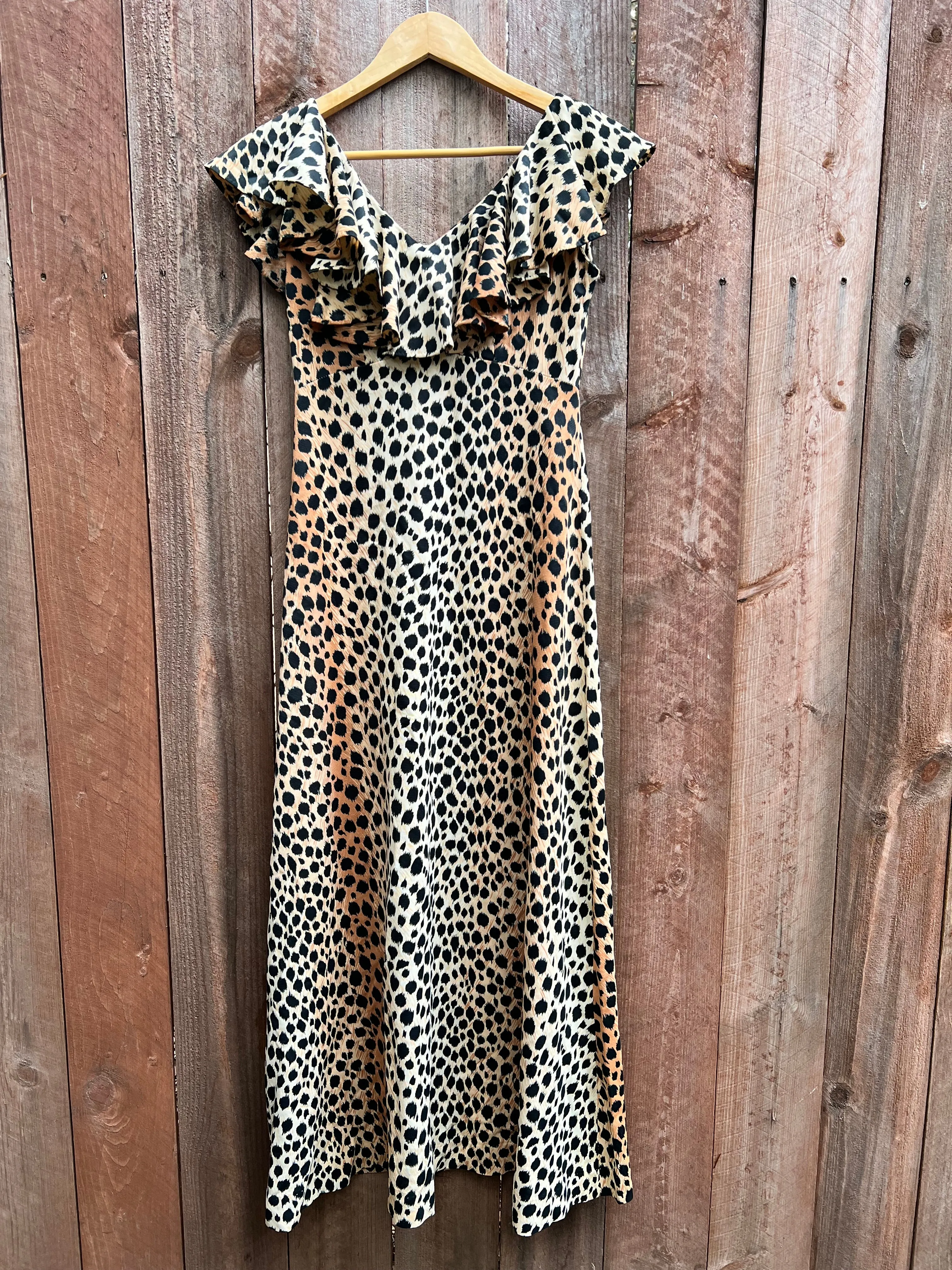 VINTAGE: Cheetah Print Ruffle Dress sold by Vanessa Mooney