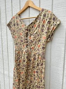 SAMPLE:  Light Floral Lace-Up Mini Dress sold by Vanessa Mooney