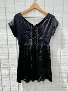 SAMPLE:  Black Satin Lace-Up Mini Dress sold by Vanessa Mooney