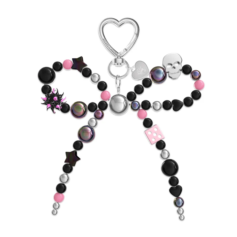 Gothic Bow Bag Charm sold by Velvet Caviar