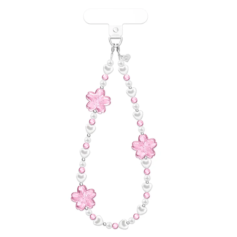 Cherry Blossom Phone Charm sold by Velvet Caviar