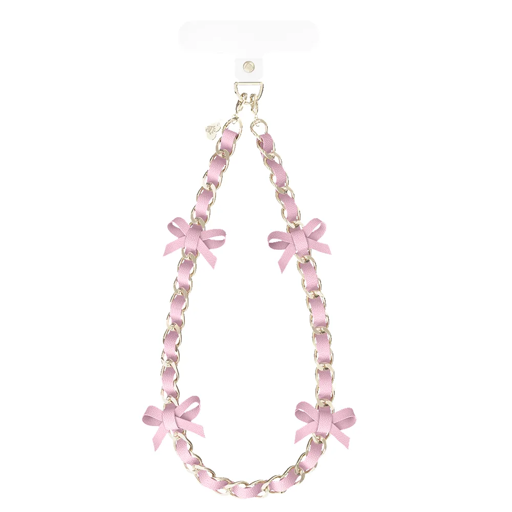 Pink Bow Leather Chain Phone Charm sold by Velvet Caviar