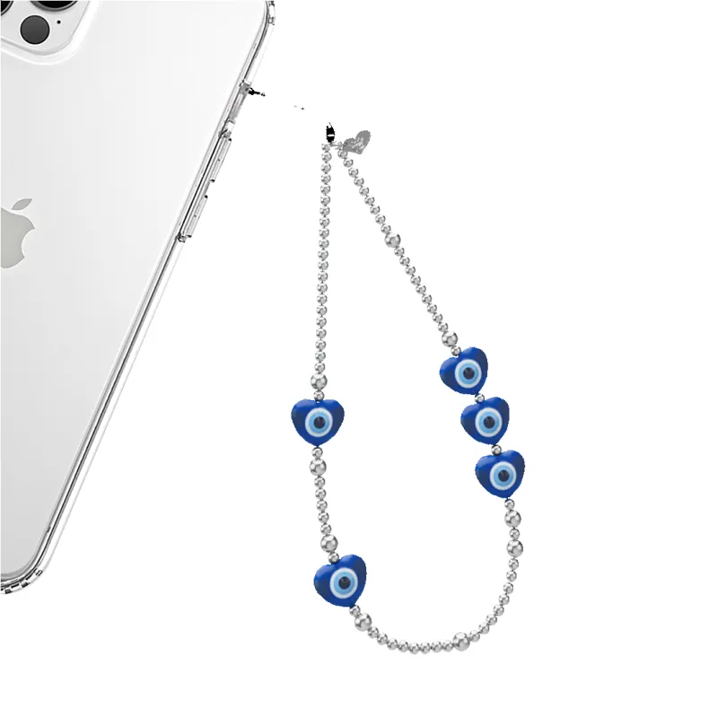 Evil Eye Heart Phone Charm sold by Velvet Caviar