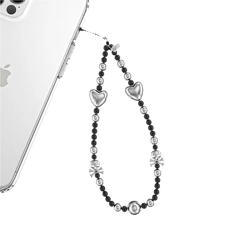 Chrome Skulls Phone Charm made by Velvet Caviar