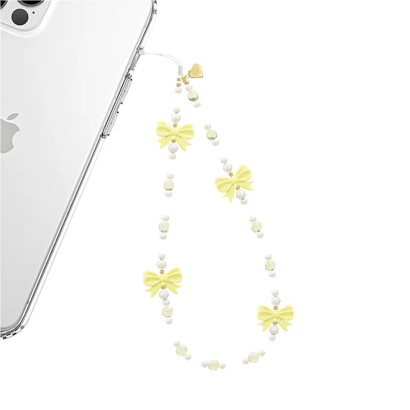 Buttercup Bows Phone Charm sold by Velvet Caviar