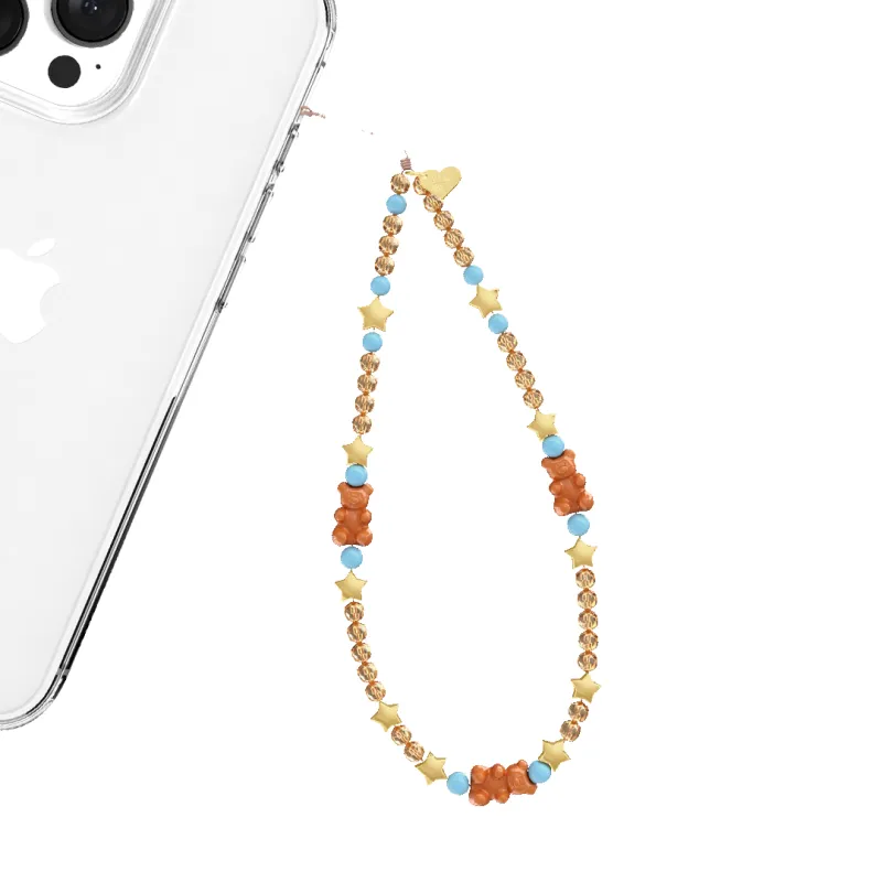 Cowboy Teddy Phone Charm sold by Velvet Caviar