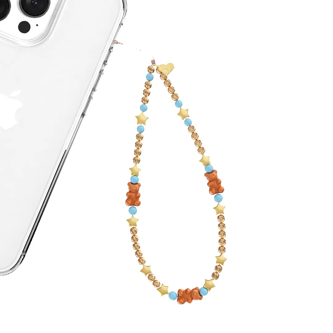 Cowboy Teddy Phone Charm sold by Velvet Caviar