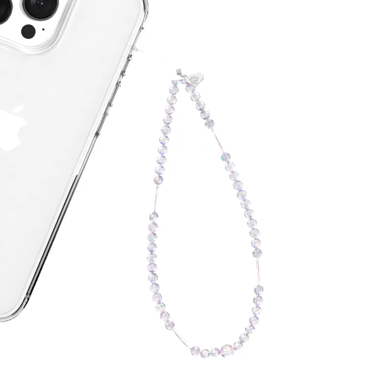 Holo Heart Phone Charm sold by Velvet Caviar