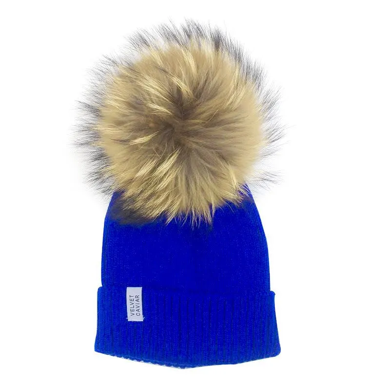 LUX FUR POM BEANIE BLUE WITH CHESTNUT FUR sold by Velvet Caviar