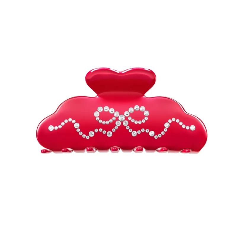 Red Crystal Bow Hair Clip sold by Velvet Caviar