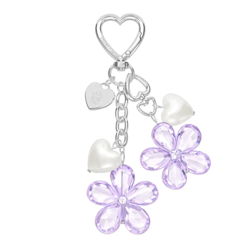 Lavender Cherry Blossom Bag Charm sold by Velvet Caviar