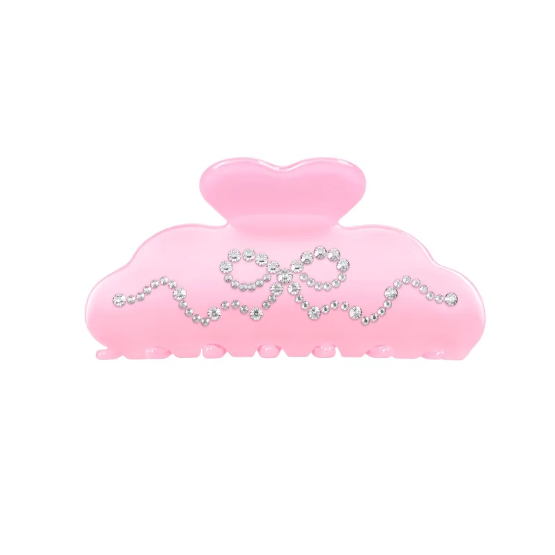 Pink Crystal Bow Hair Clip made by Velvet Caviar