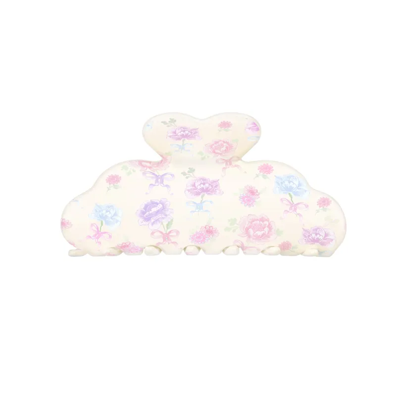 Angelic Floral Hair Clip made by Velvet Caviar