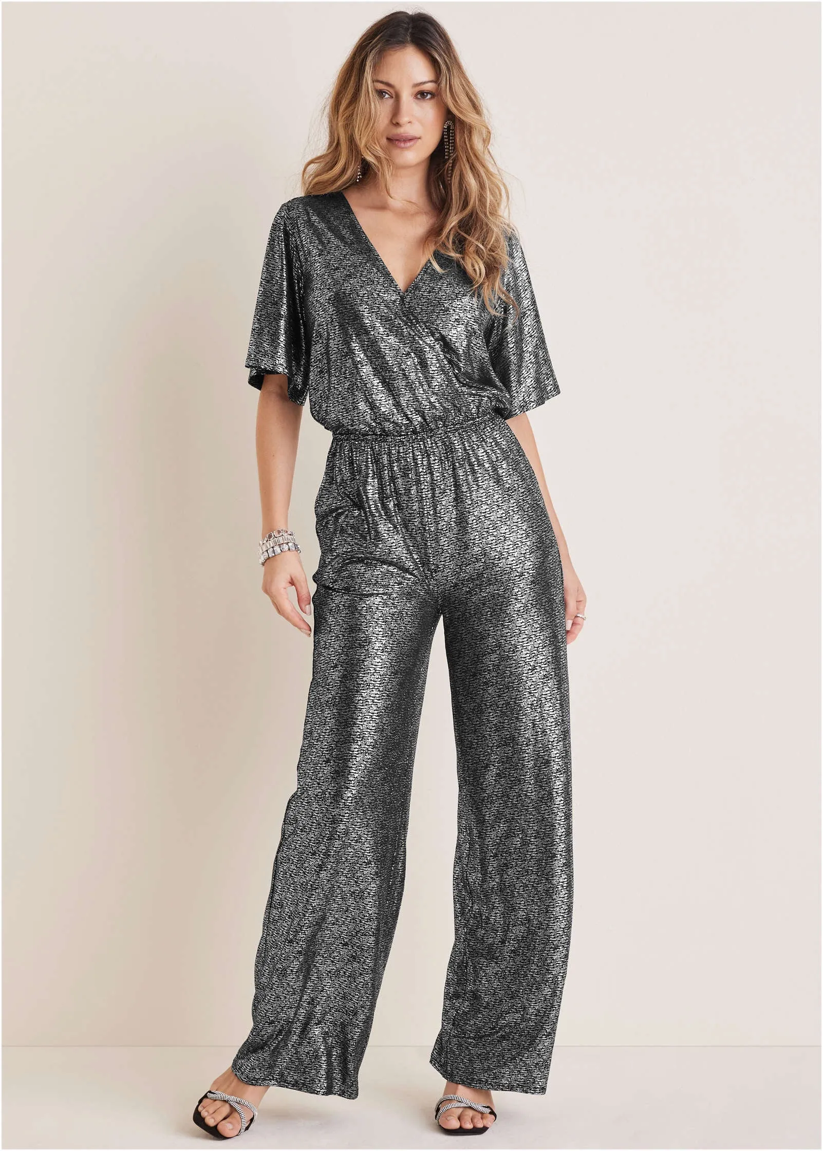 Metallic Flutter Sleeve Jumpsuit - Silver sold by VENUS