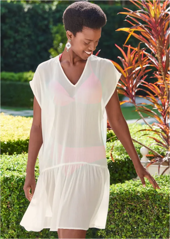 Ruffle Hem Tunic - Pearl White sold by VENUS