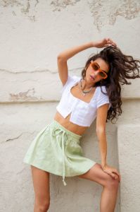 Cariño Linen Mini Skirt Sage sold by Verge Girl