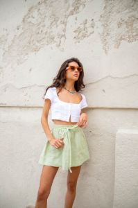 Cariño Linen Mini Skirt Sage sold by Verge Girl