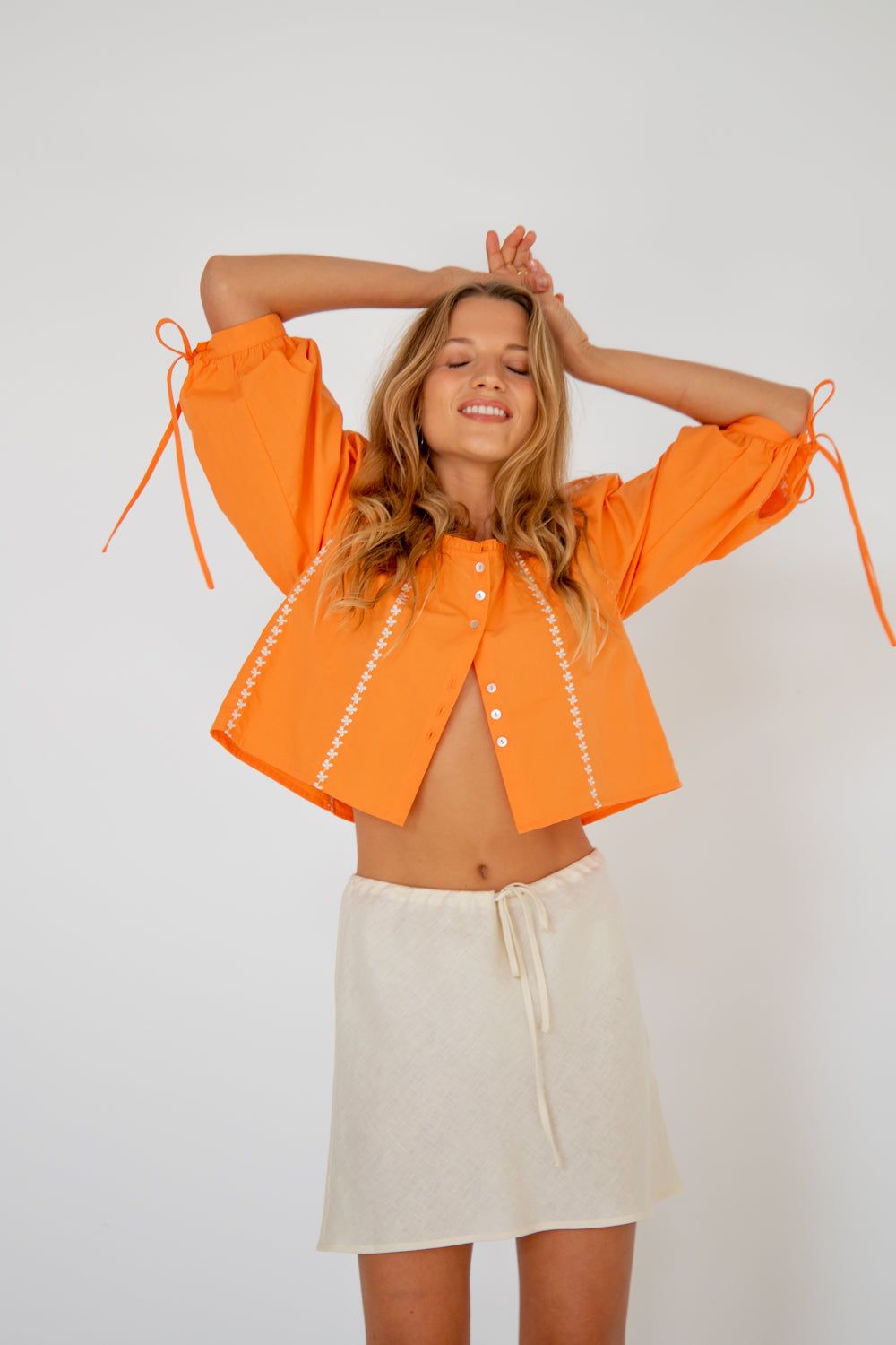 Costa Mesa Top Orange sold by Verge Girl