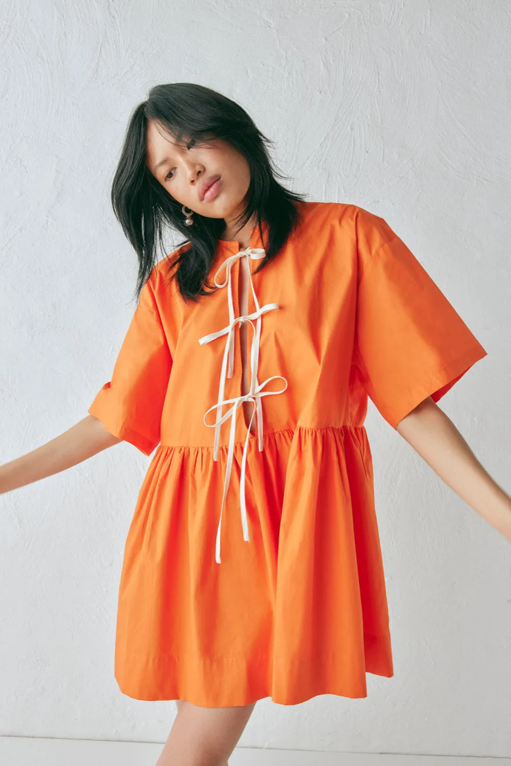 Naomi Smock Mini Dress Tangerine sold by Verge Girl