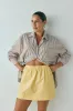 Elka Mini Skirt Lemon sold by Verge Girl
