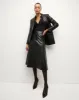 Louise Vegan Leather Skirt sold by Veronica Beard