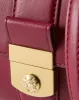 Small Crest Lock Trap Bag sold by Veronica Beard