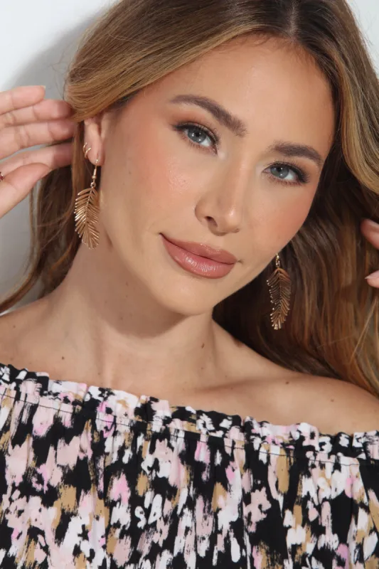 Gold Palm Leaf Earrings sold by Veronica M