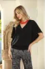 Black Stretch Surplice Top sold by Veronica M