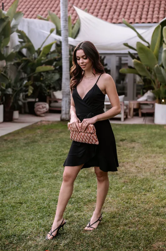 Black Stretch Ruffle Wrap Dress sold by Veronica M