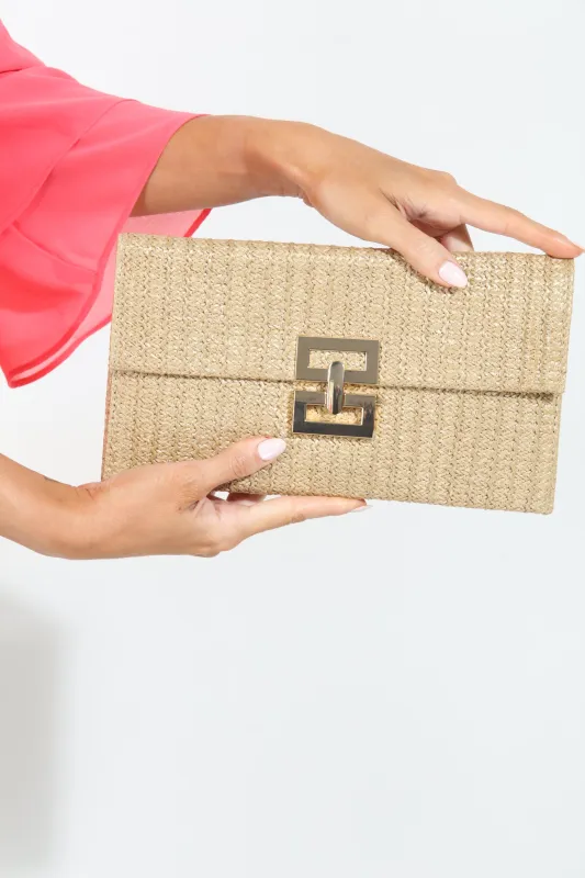 Sunrise Straw Clutch sold by Veronica M