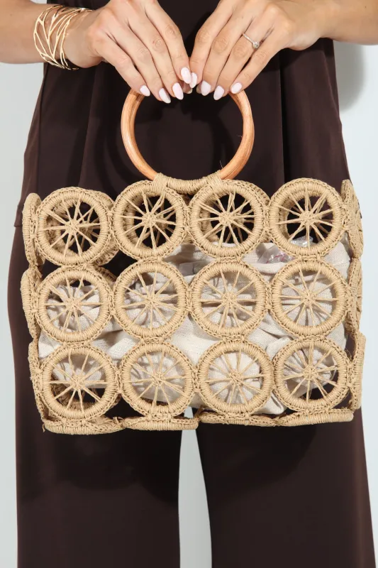 Shiloh Woven Cutout Handbag sold by Veronica M