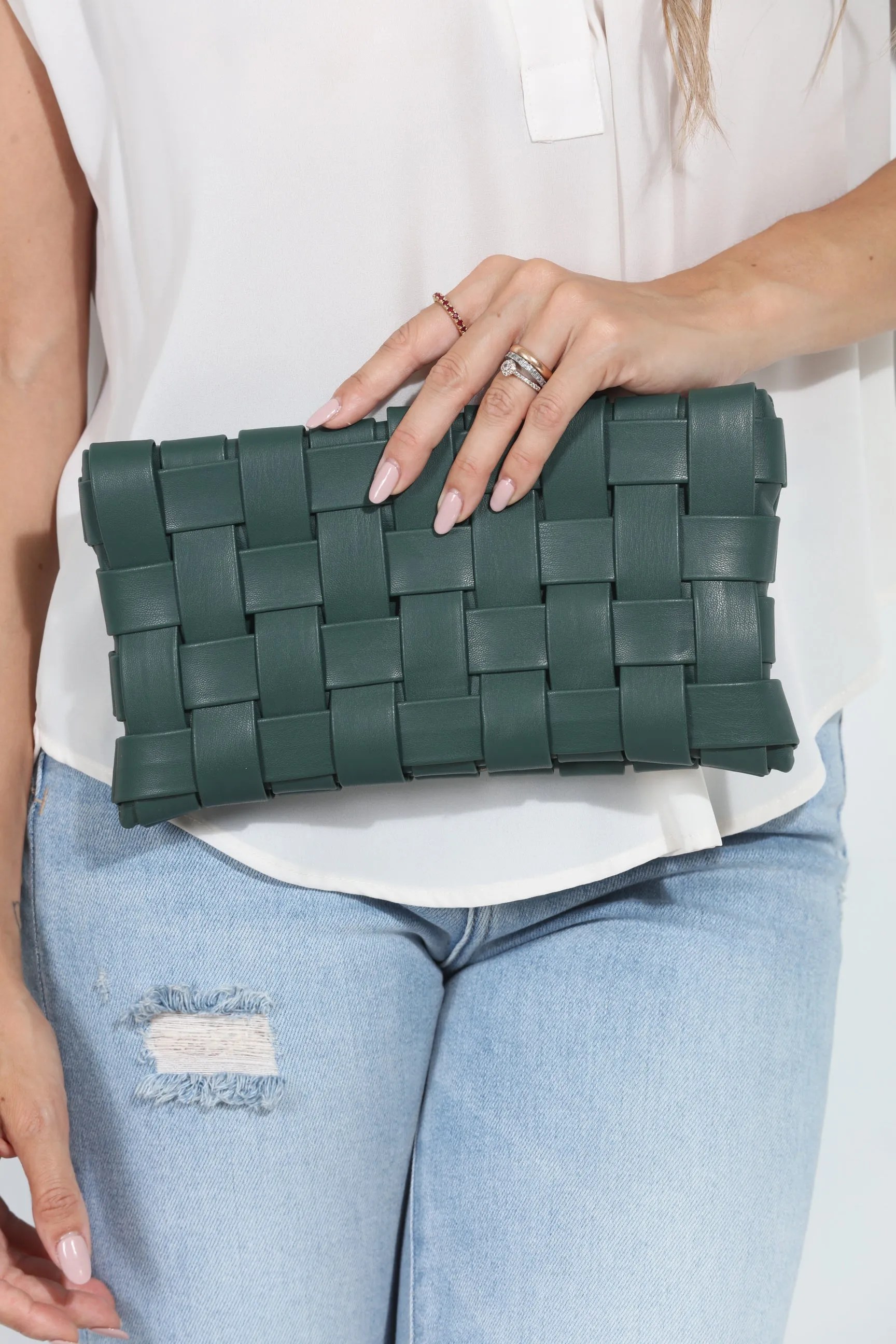 Forest Green Woven Clutch sold by Veronica M