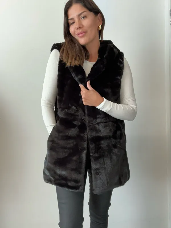 Black Faux Fur Hooded Vest sold by Veronica M