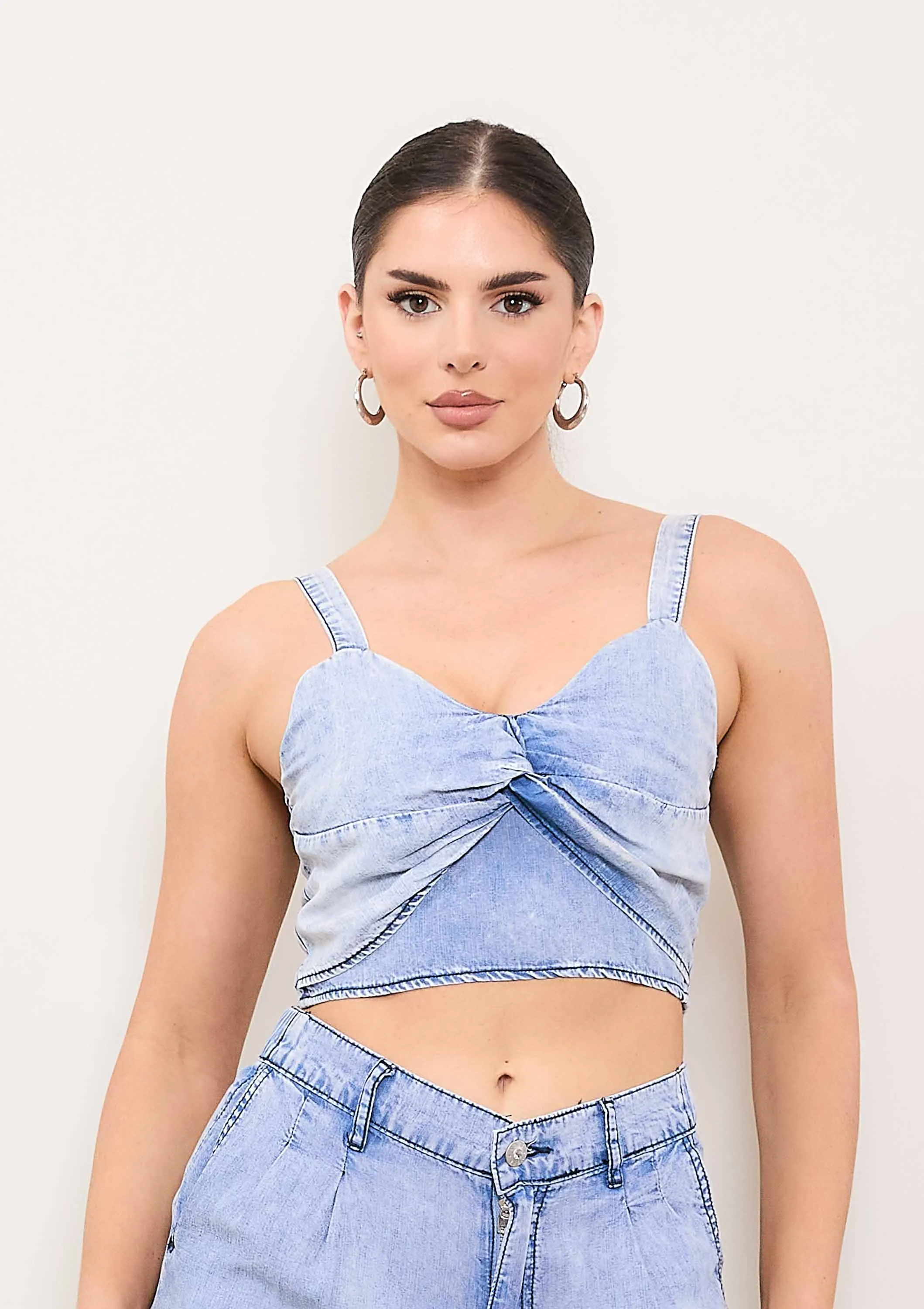 Denim Cross Knotted Cropped top sold by Vibrant