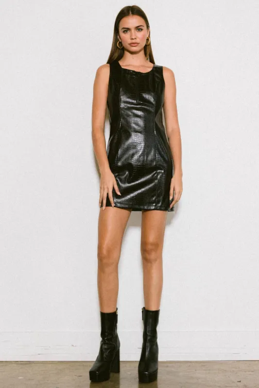 HALLOWEEN VEGAN LEATHER MINI FRONT ZIPPER DRESS sold by Vibrant