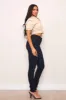 Mid-Rise Skinny Jeans sold by Vibrant