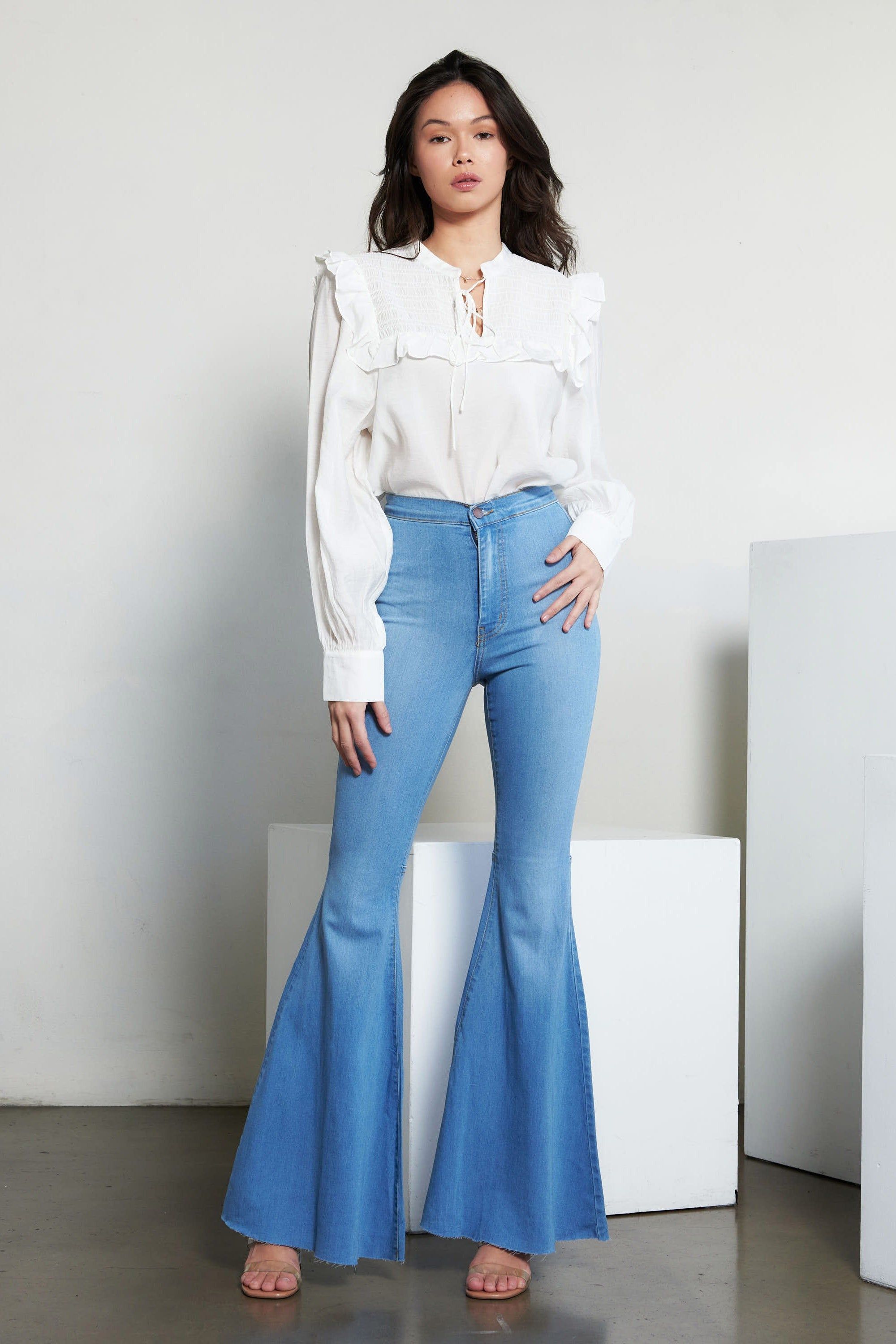 Vibrant Flare Jeans sold by Vibrant