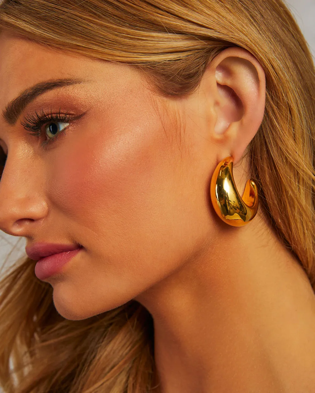 Night Life Crescent Moon Hoop Earrings sold by Vici