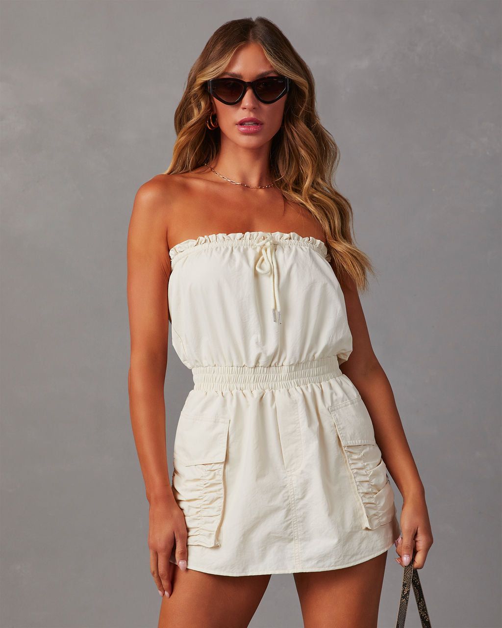 Romana Strapless Drawstring Romper sold by Vici
