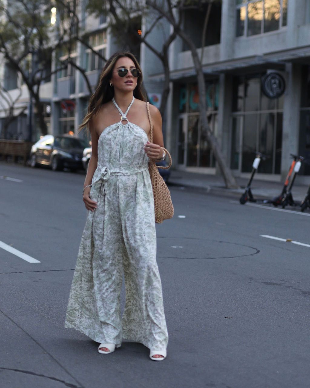 Caribbean Coast Dreams Printed Pocketed Halter Jumpsuit sold by Vici