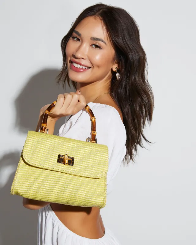 Skyler Raffia Top Handle Bag sold by Vici