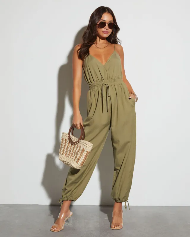 Robyn V-Neck Tie Waist Jumpsuit sold by Vici