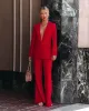 Runway Pocketed Belted Flare Trousers sold by Vici