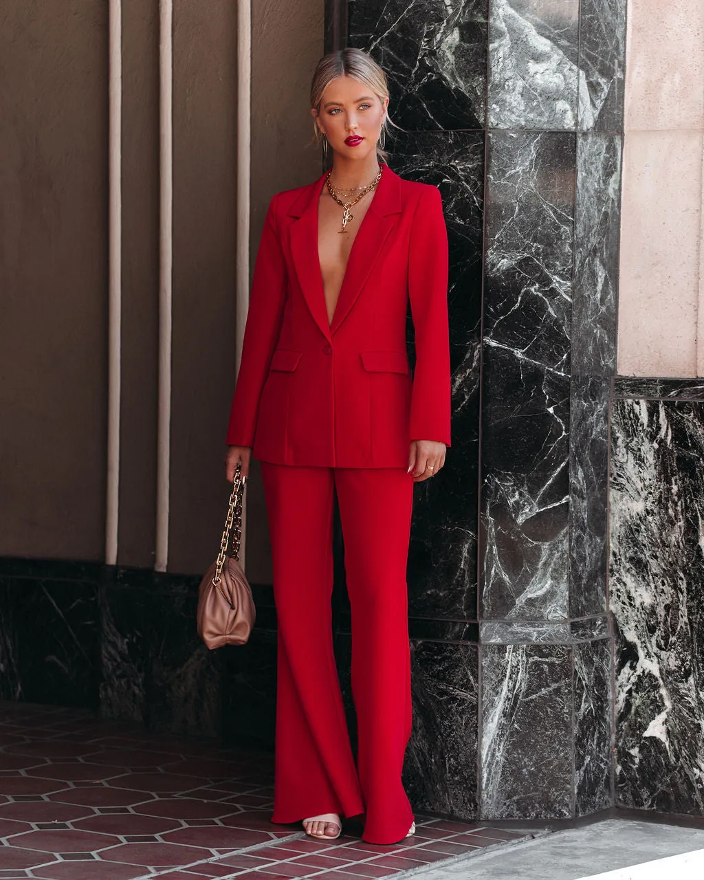 Runway Pocketed Belted Flare Trousers sold by Vici