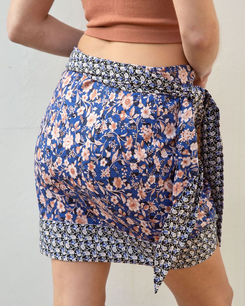 Free To Roam Cotton Floral Wrap Mini Skirt - Navy Multi - FINAL SALE sold by Vici product image thumbnail 4