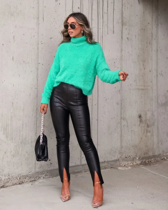 Tell Me About It Stud Faux Leather Split Hem Pants sold by Vici