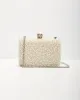 Feeling Popular Pearl Clutch sold by Vici