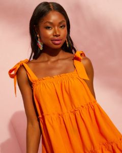 Sansa Shoulder Tie Tiered Mini Dress sold by Vici